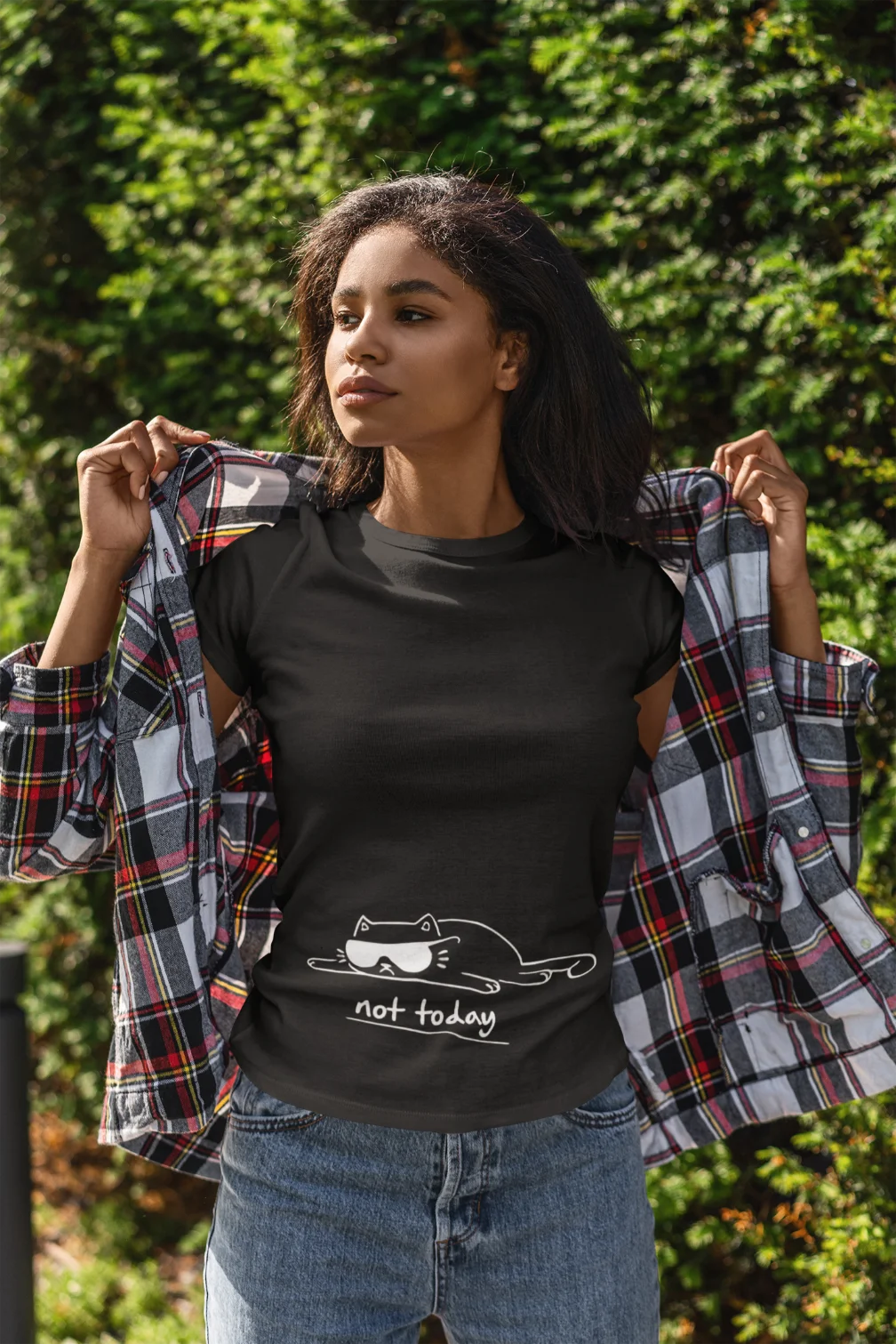 model wearing black t-shirt with black cat fun design